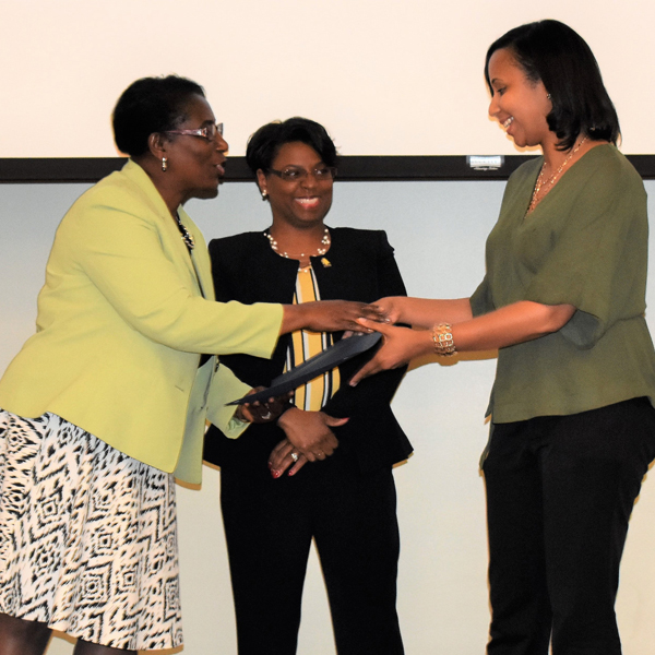 Penelope Smith receives the The Aggie Pride Award for Going The Extra Mile