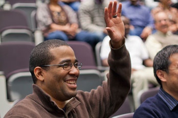 a and t student in class raising his hand