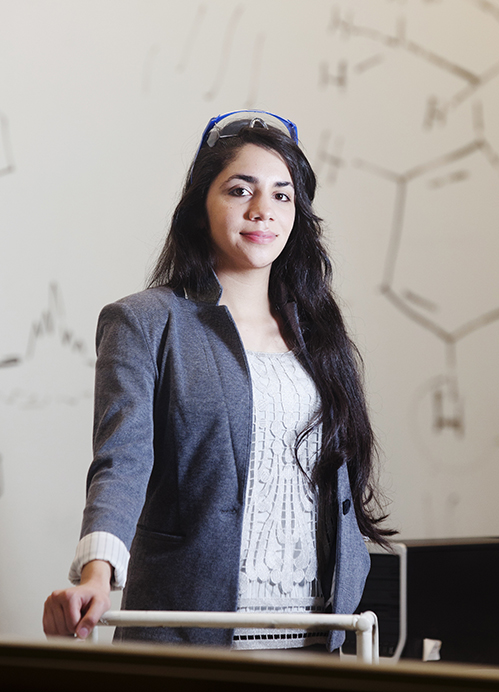 student-female-standing-chemistry.jpg