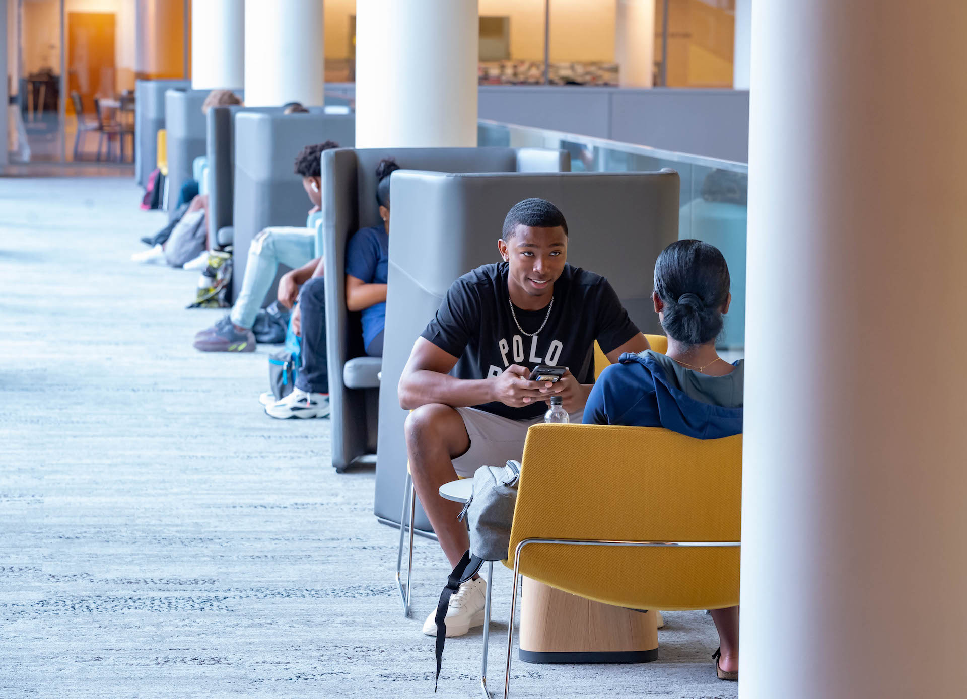 students sitting socializing at the student center 