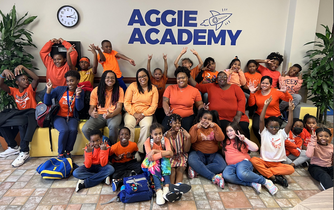 The homepage image requested was the Unity Day picture under the heading. A caption could be ‘Aggie Academy brings awareness to Unity Day by wearing orange.’ 