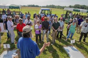 Group of extension agents and farmers being trained about hemp