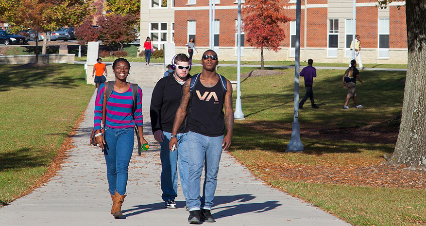 Students walking/socializing near aggie villages