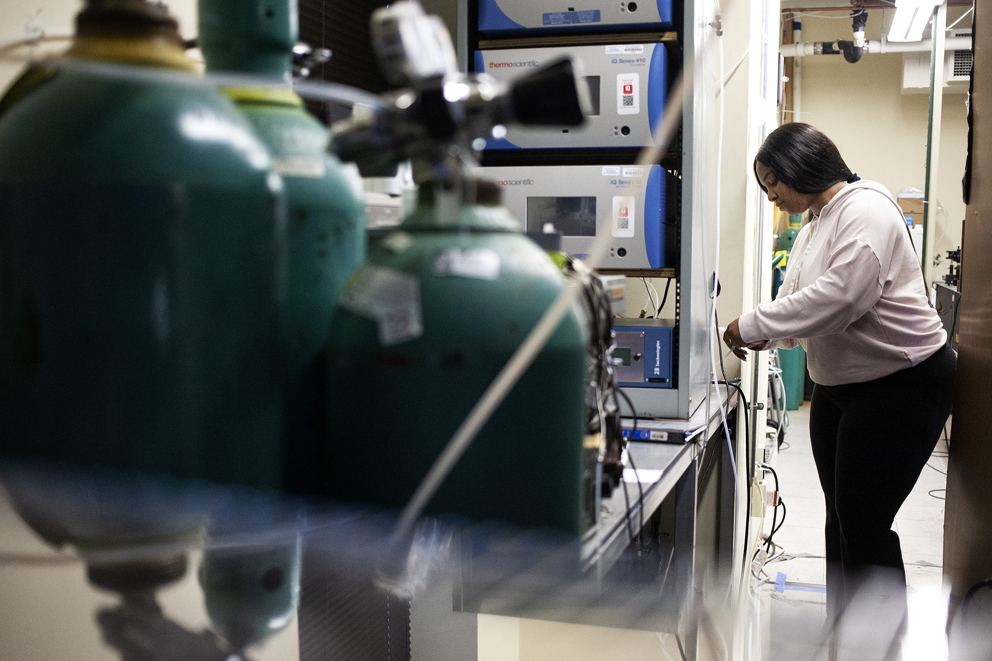 a graduate student working in a physics research lab