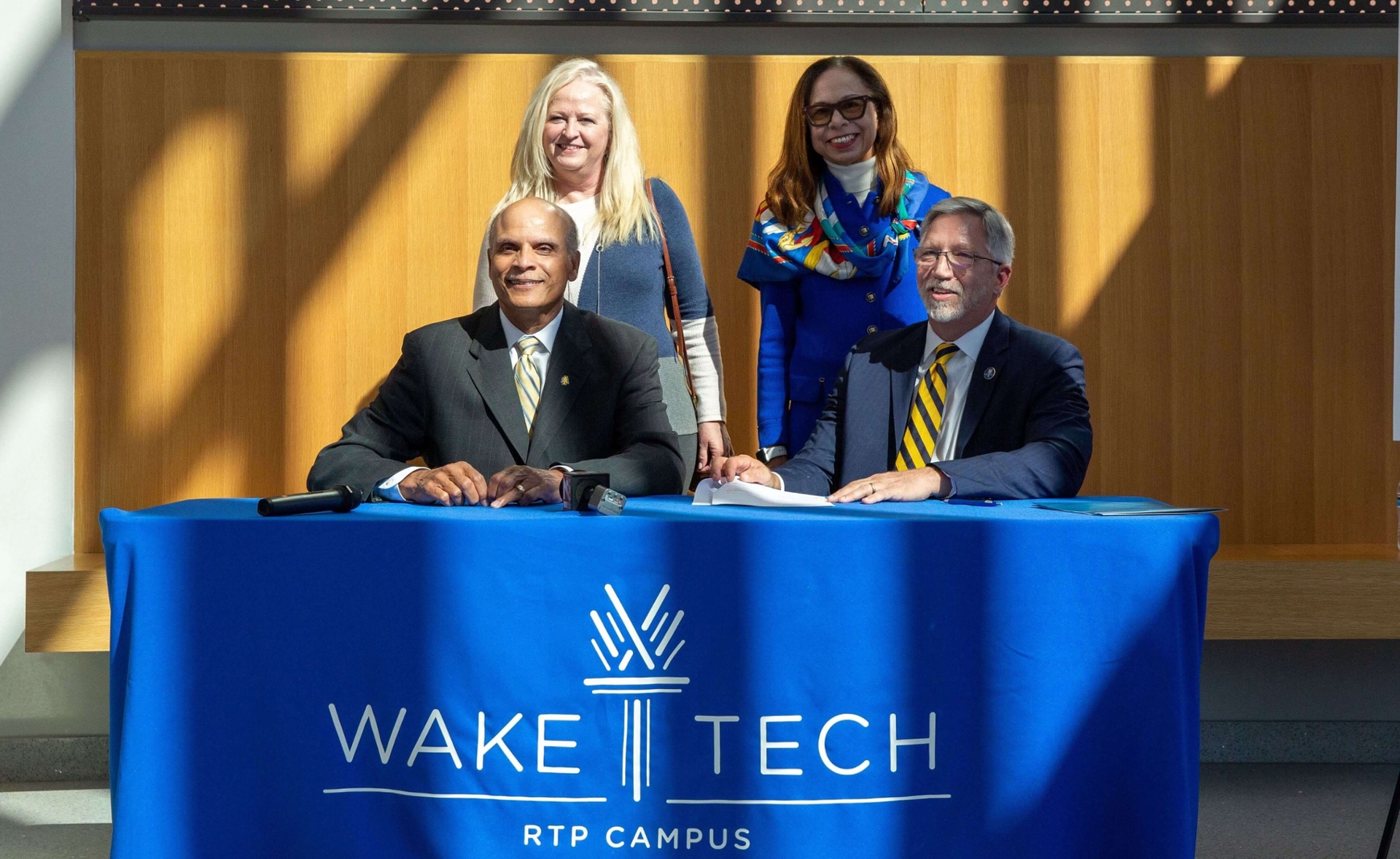 N C A T Wake Tech Sign Technology Education Partnership Agreement