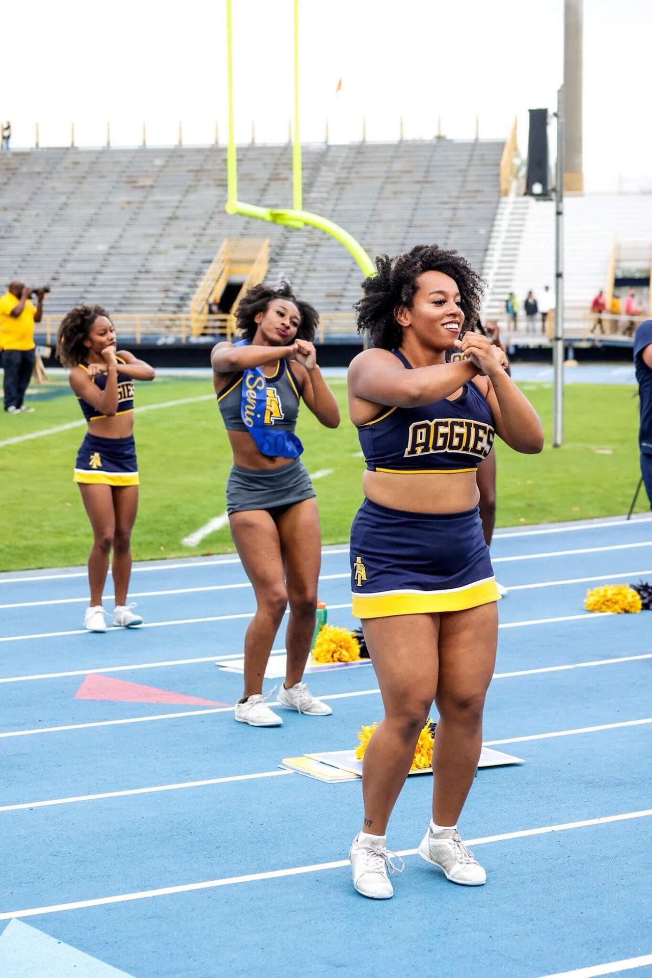 Alivia Barrow, in front, cheering at Truist Stadium