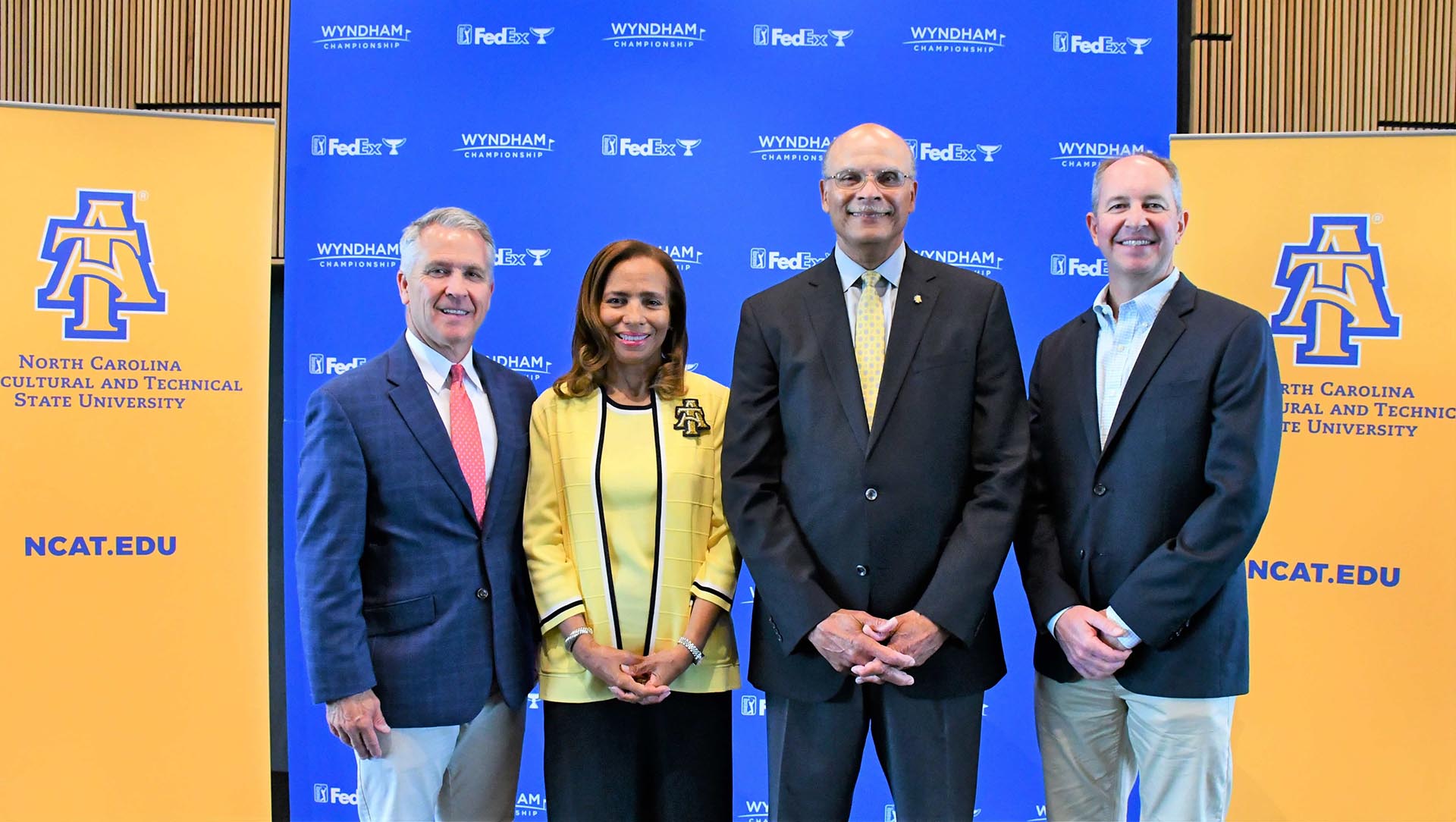 iedmont Triad Charitable Foundation CEO Mark Brazil, Davida Martin, Chancellor Harold L. Martin Sr. and Wyndham Championship tournament director Bobby Powell